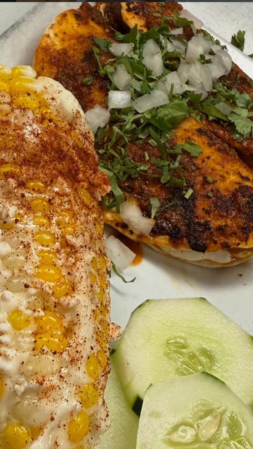 Sandwich and corn on the cob at Uncle John's BBQ